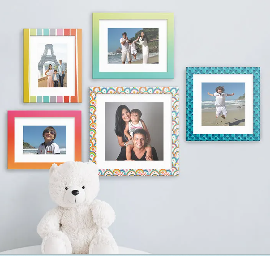 Colourful gallery wall with multiple photo frames for kids room decor