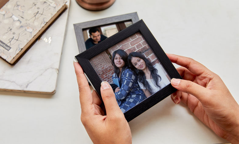Personalized photo frames displaying memorable pictures of best friends